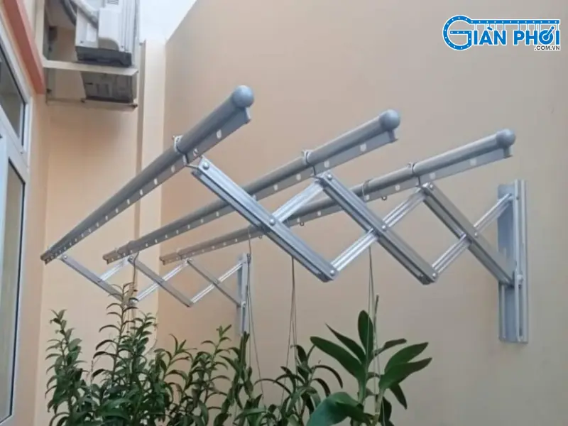 thay thanh phơi giàn phơi gắn tường