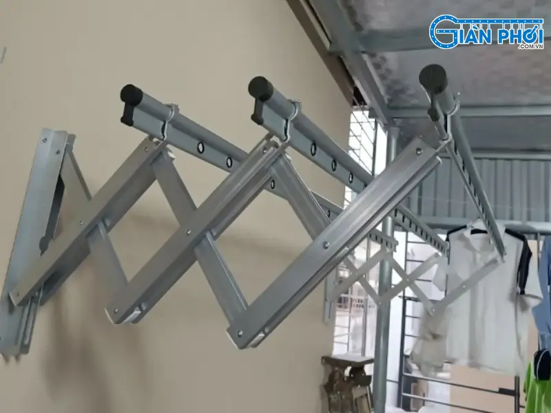 sửa bản lề cố định giàn phơi xếp ngang